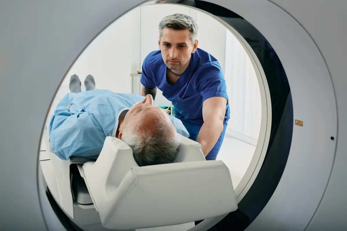 An allied health professional taking a patient's vitals