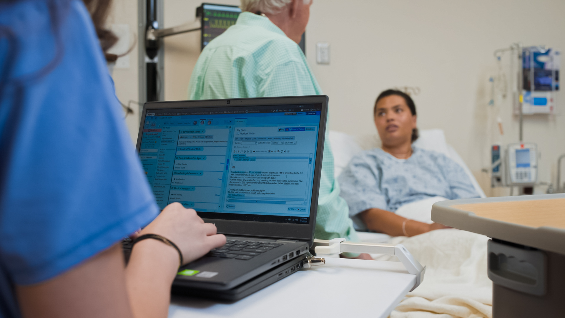 A Propel Fellow documenting at the bedside