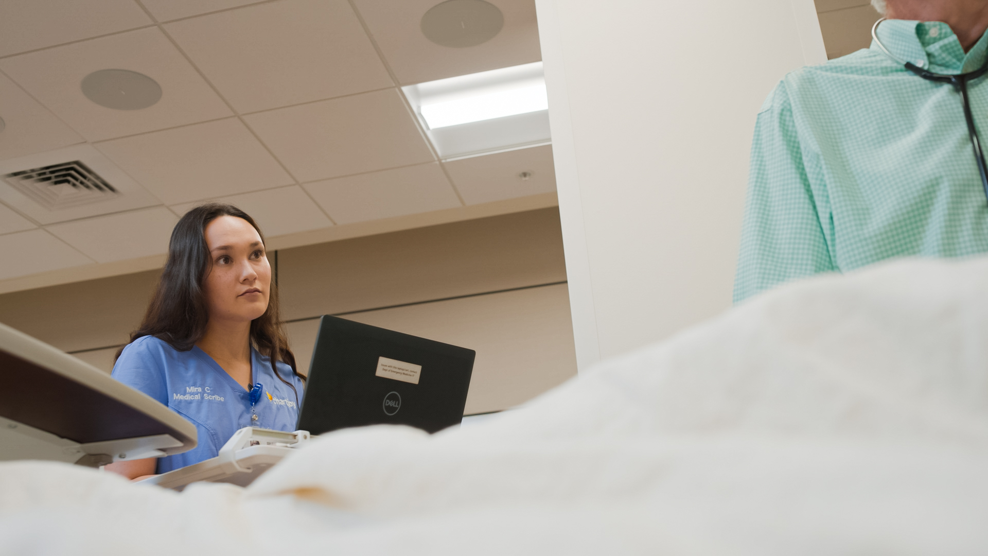 A research coordinator working in the clinical record