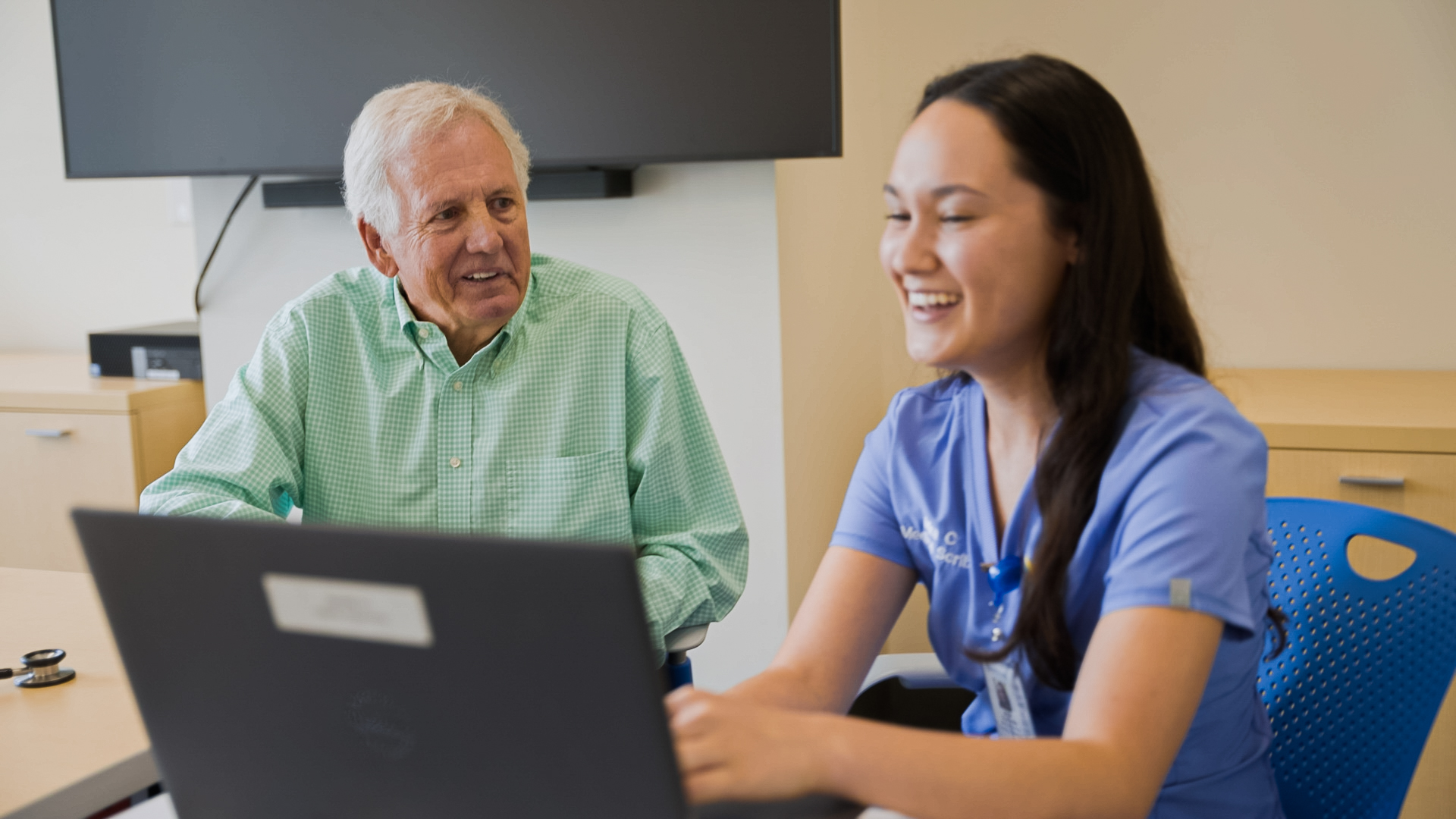 A Propel Fellow and physician working together