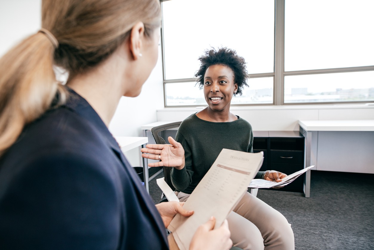 A clinical research professional reviewing study documents